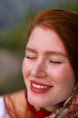 a close up of a person with a cell phone