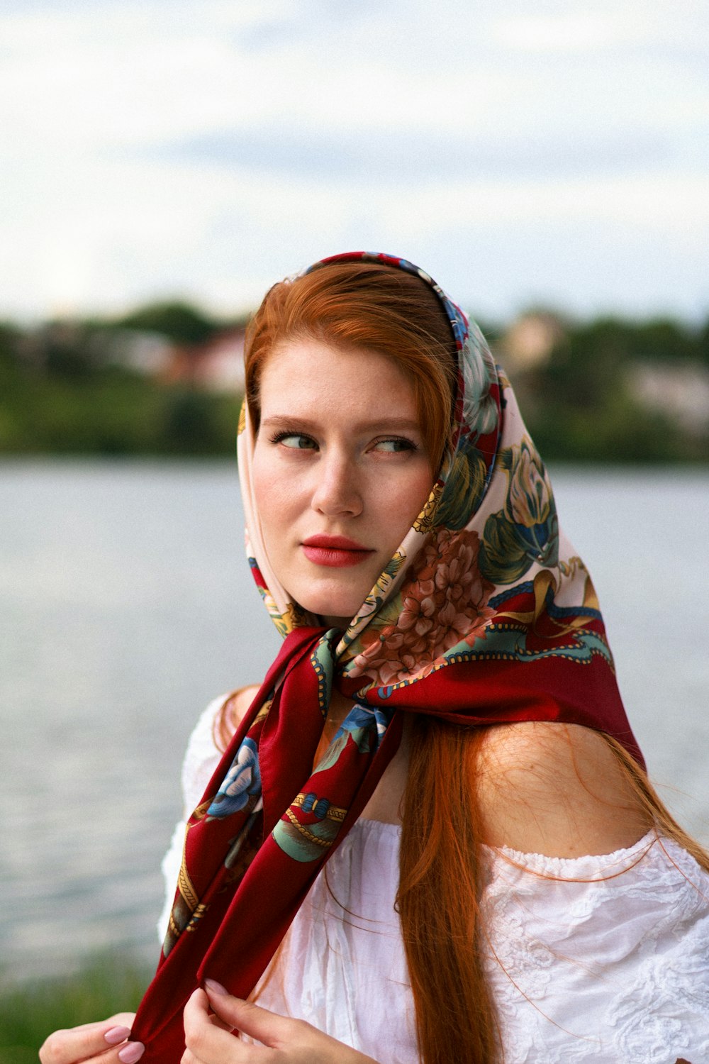 a woman with a scarf around her neck