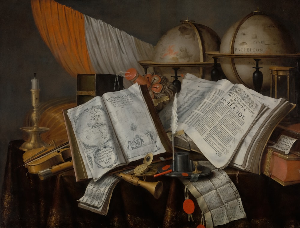 a painting of books and other items on a table