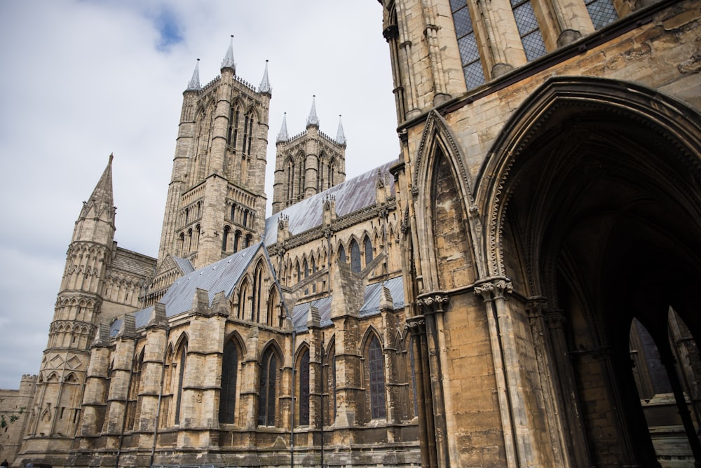 a large cathedral with a clock on the front of it