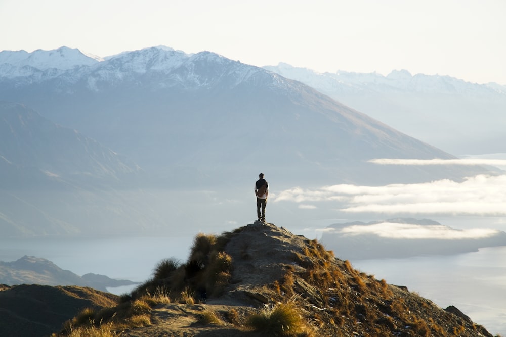 a person standing on top of a mountain