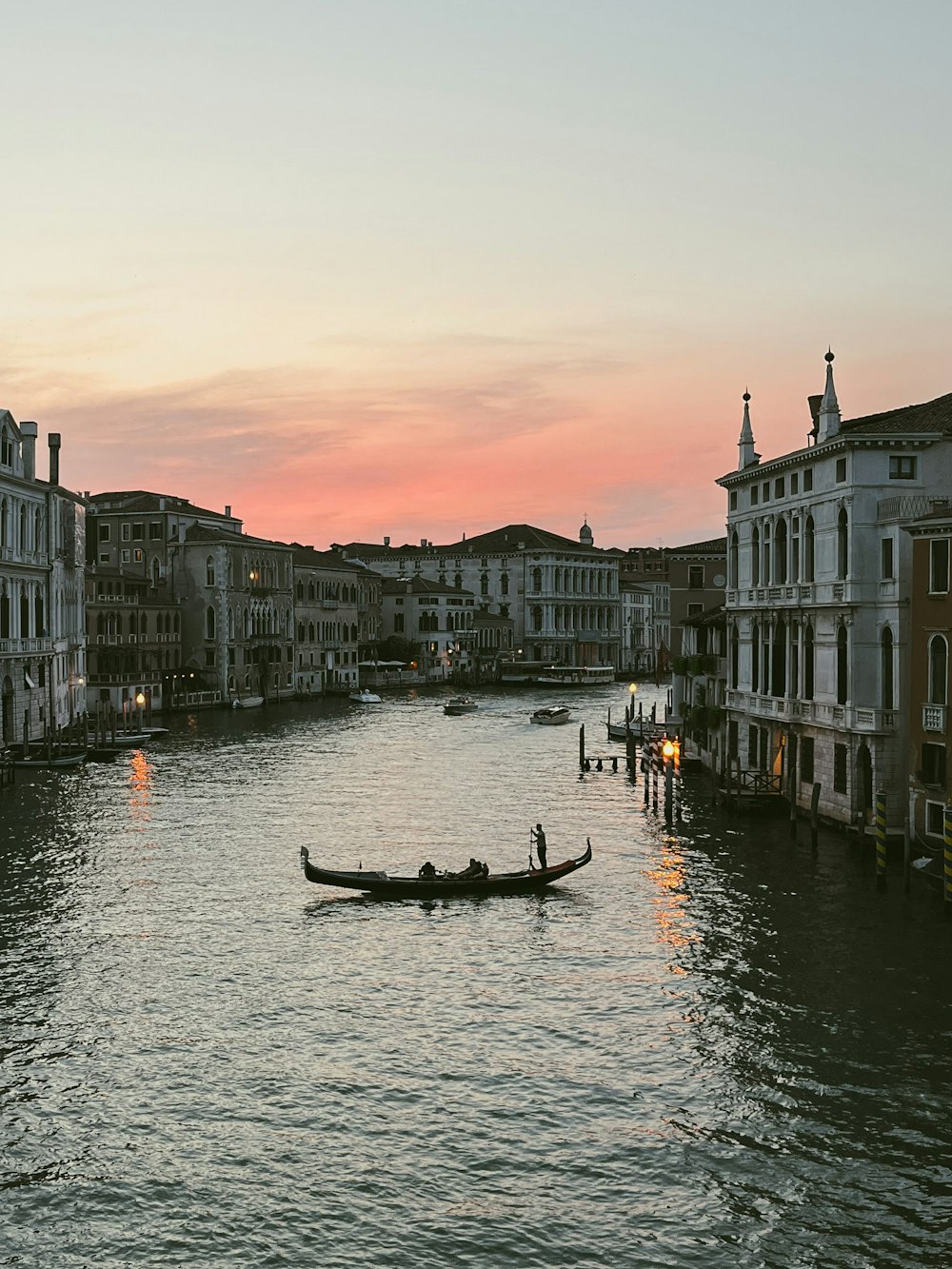 a gondola in the middle of a body of water