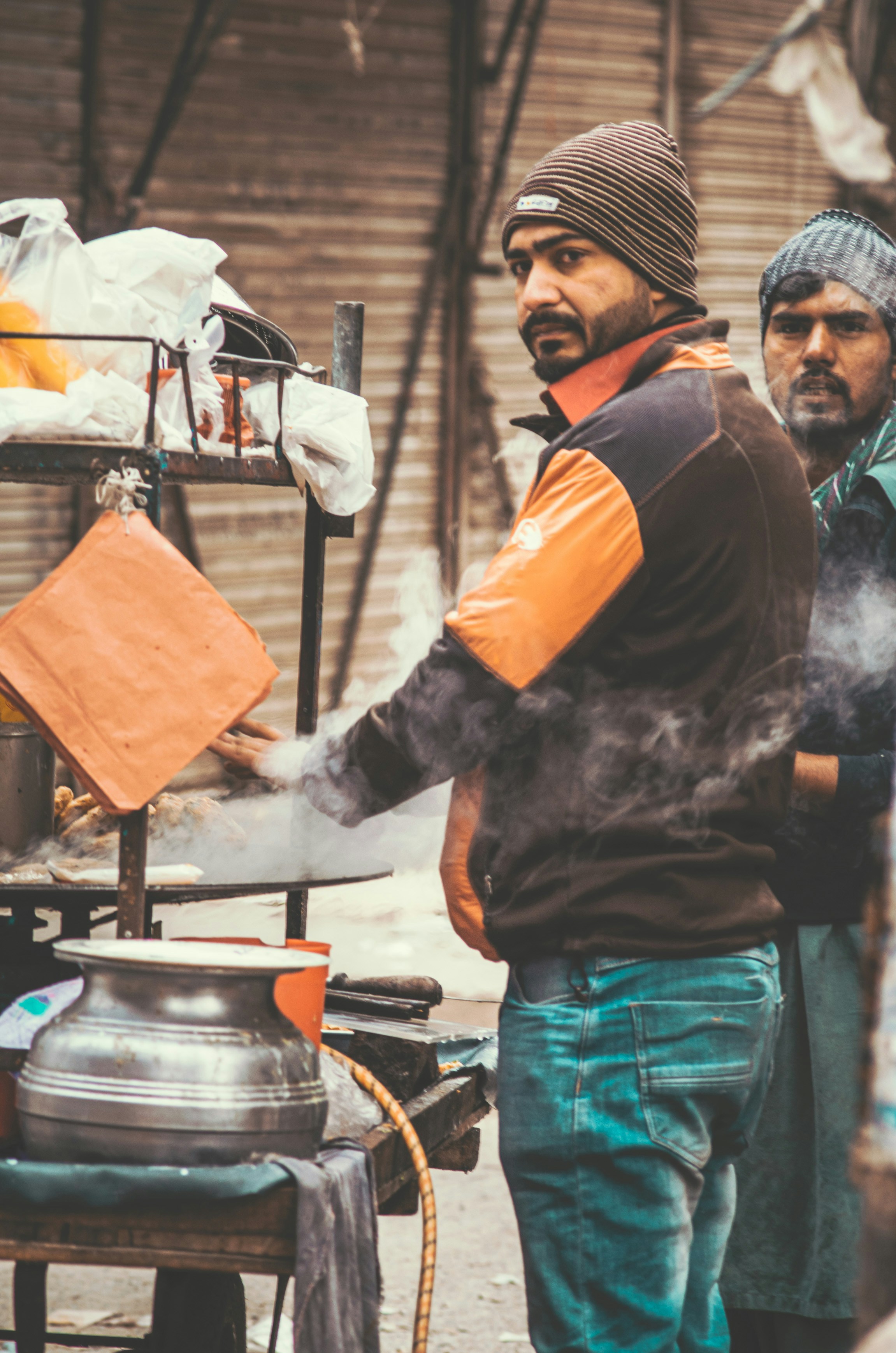 a couple of men standing next to each other