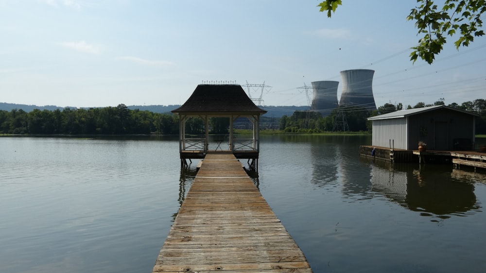 a wooden dock sitting next to a body of water