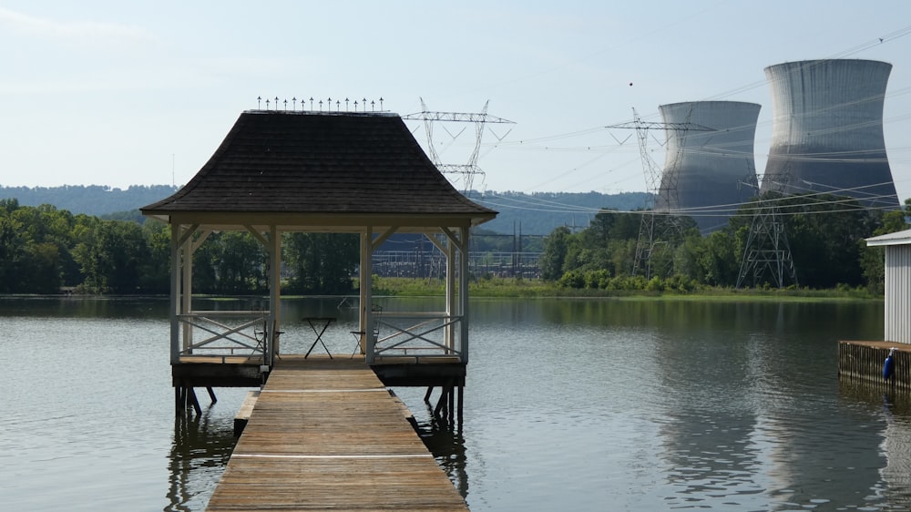 a wooden dock sitting next to a large body of water