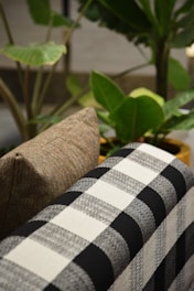 Close-up of breathable cotton and linen pillows with natural textures.