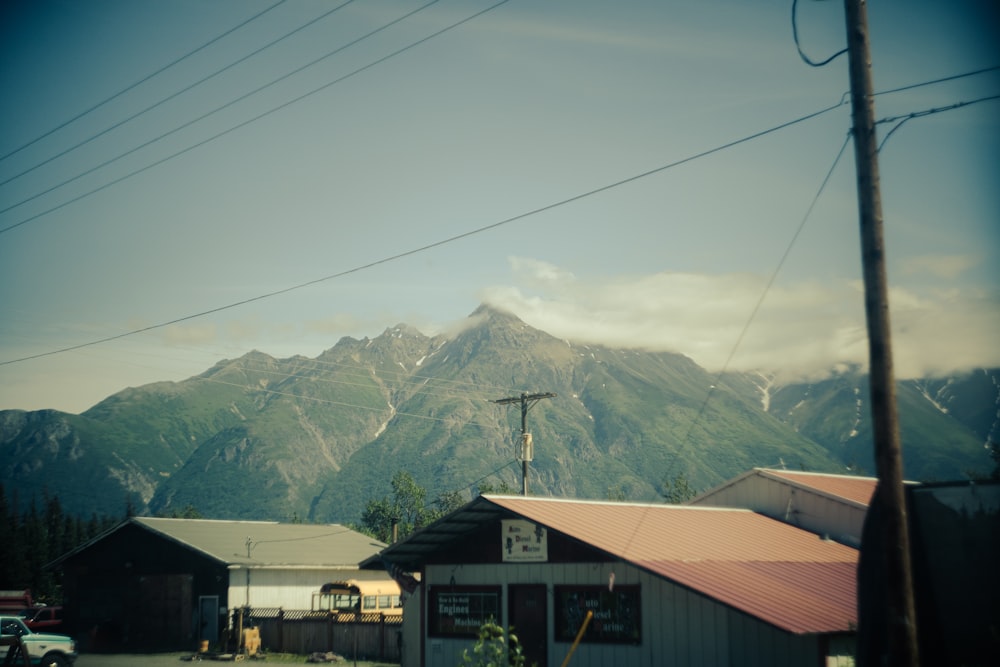 a view of a mountain range from a small town