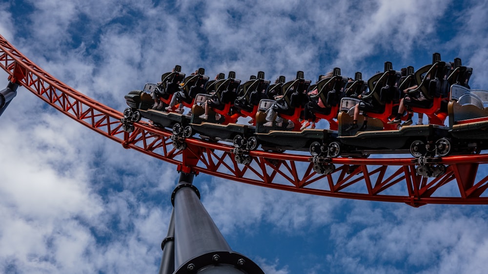 a roller coaster ride with a sky background