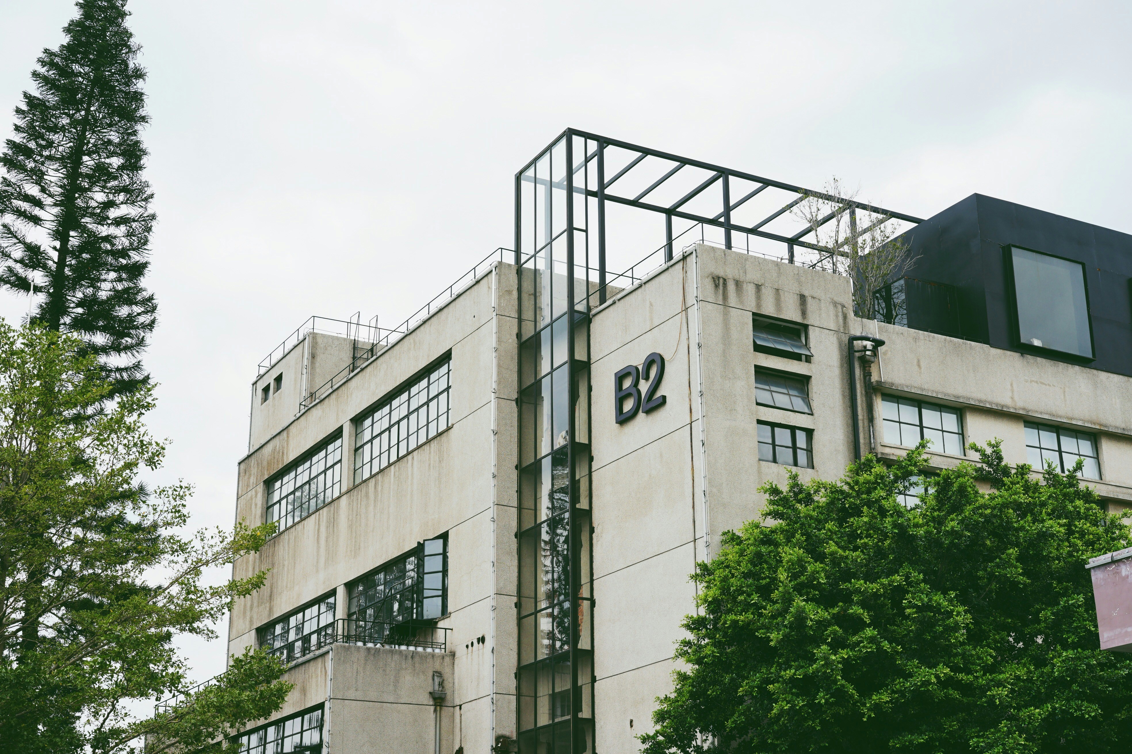 a tall building with a clock on the side of it