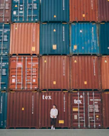 A friendly customer service representative wearing a headset, ready to assist with shipping container inquiries.