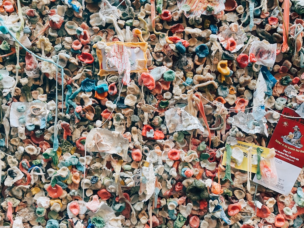 a wall covered in lots of stuffed animals