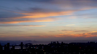 A scenic shot from one of our travel stops, capturing a city skyline at dusk.