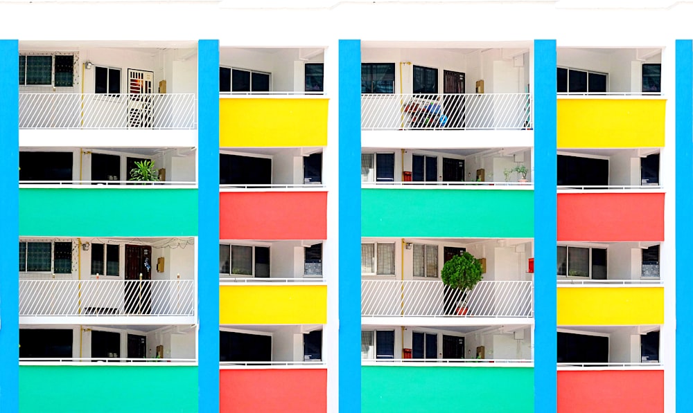 a multicolored building with balconies and balconies