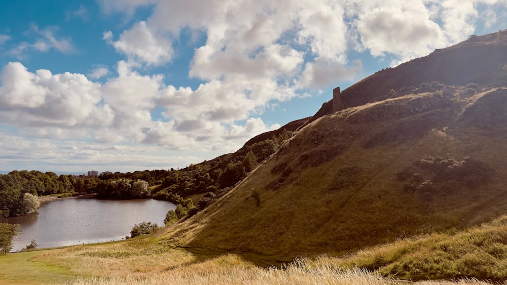 a mountain with a lake in the middle of it