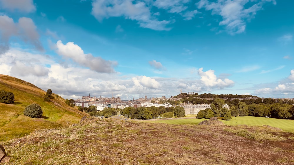 a view of a city from the top of a hill