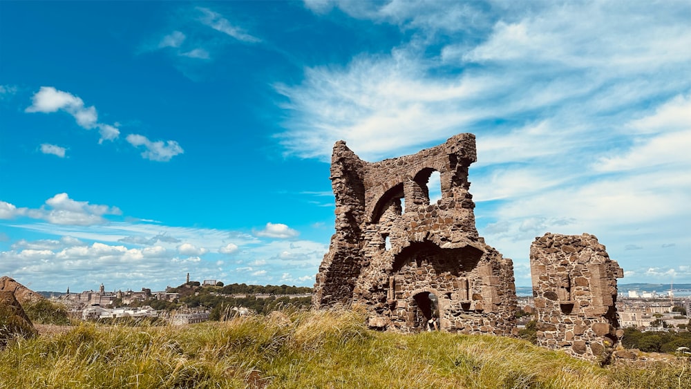 the ruins of an old building on a hill