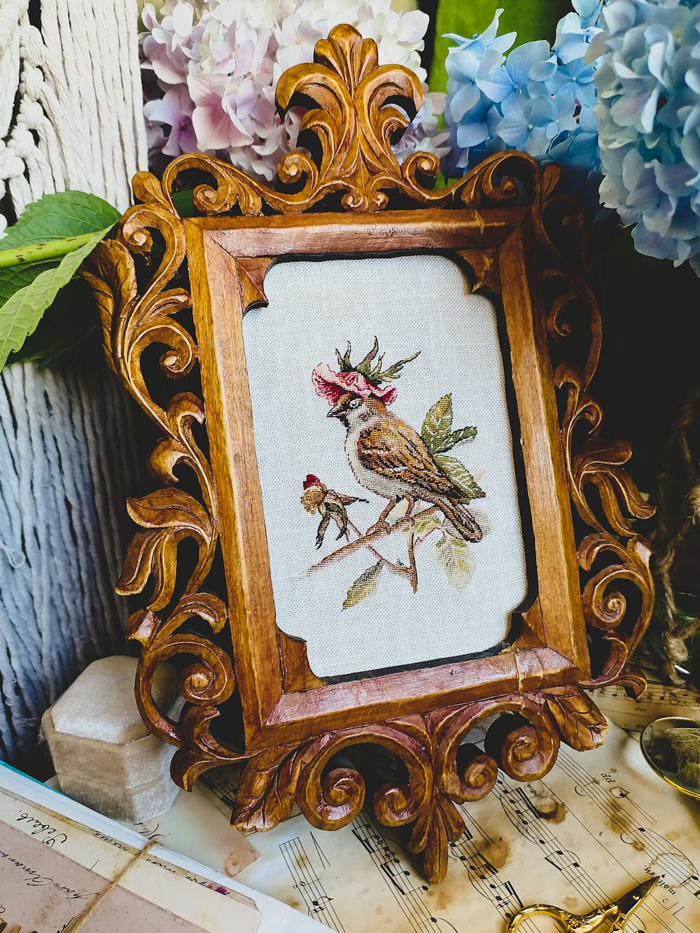a picture frame with a bird on it