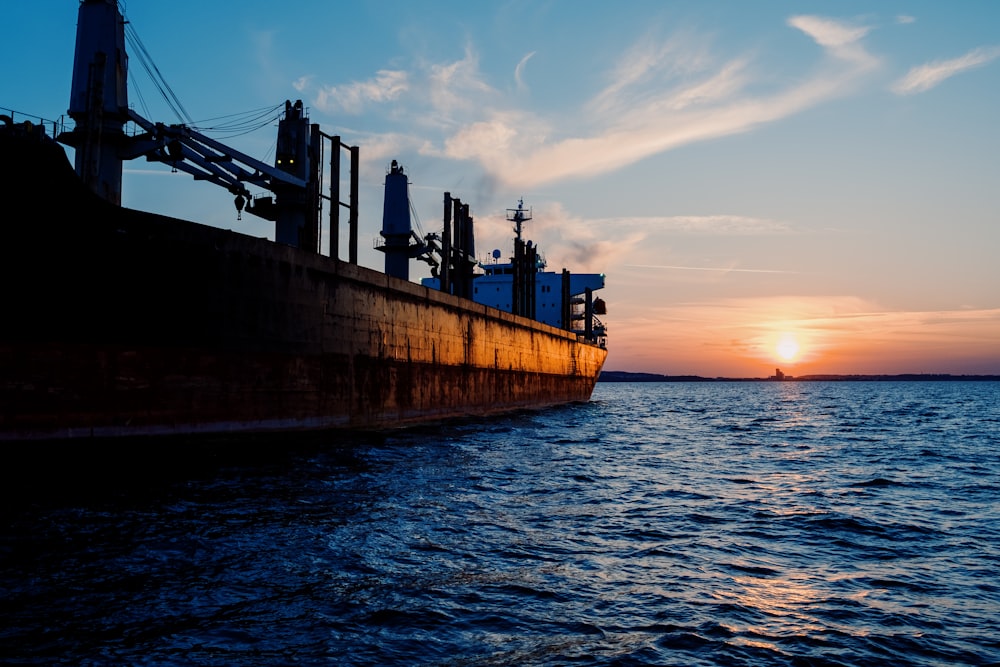 a large ship sitting on top of a body of water