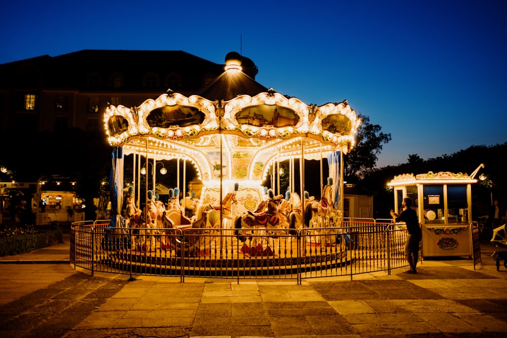 a merry go round in a park at night