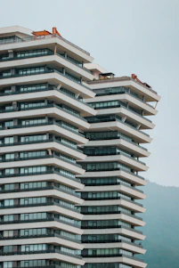 A panoramic view of the Bellissima Building in Baner, Pune, bustling with activity and showcasing modern construction.