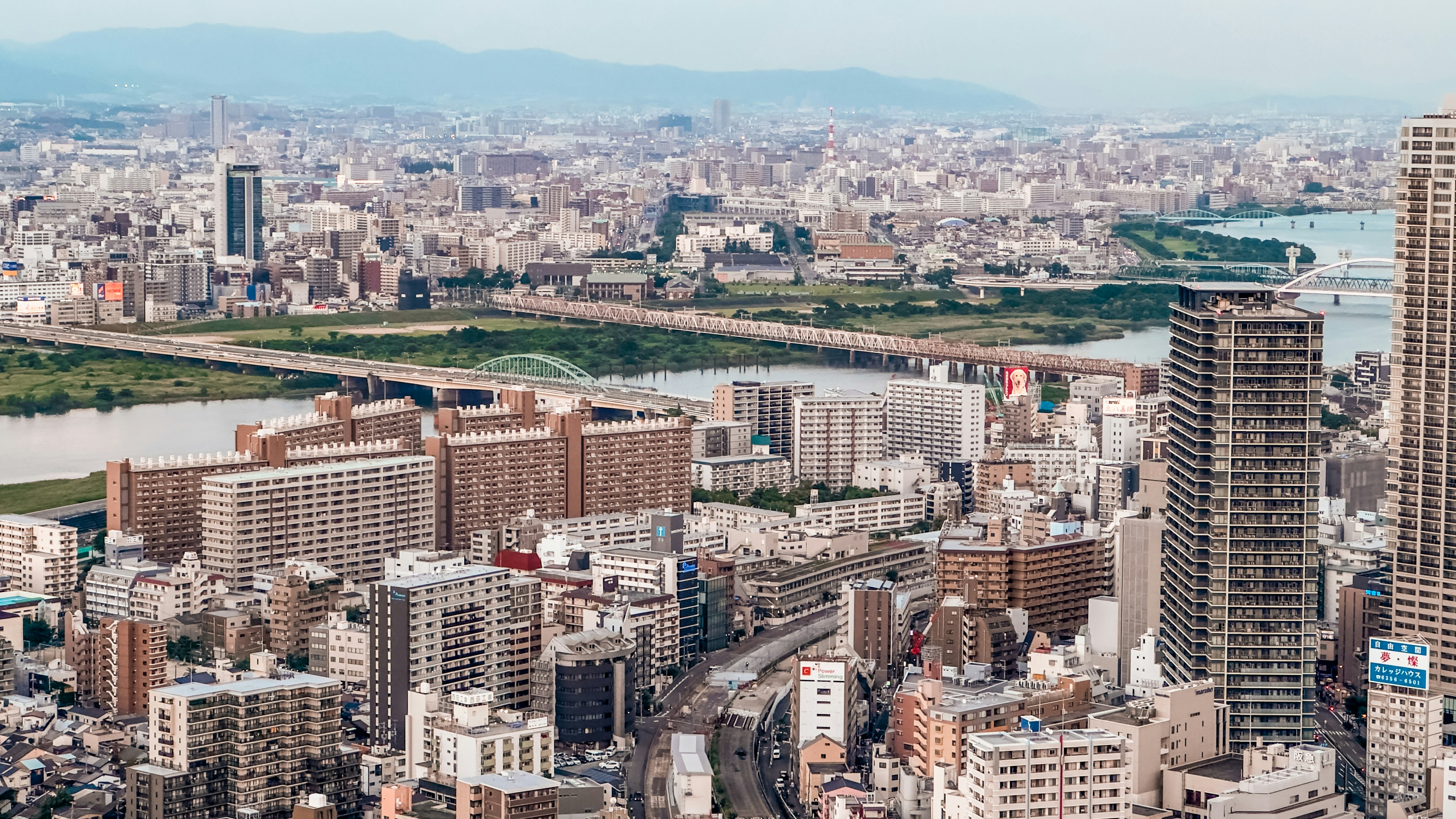 a view of a city with a river running through it