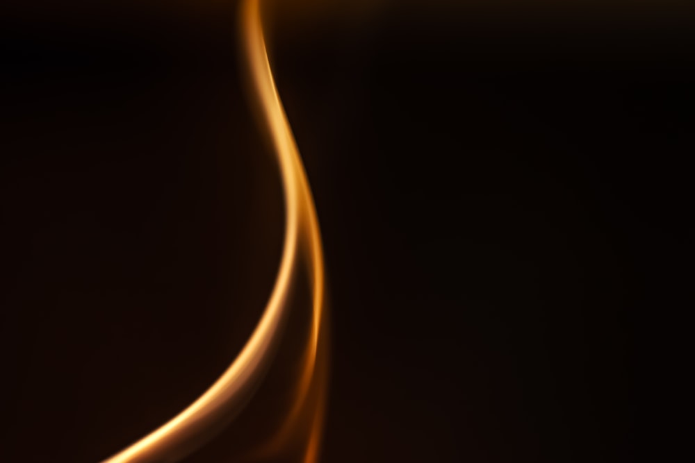 a close up of a fire with a black background