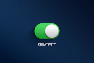 a green button with the word creativity on it