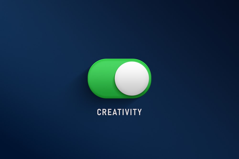 a green button with the word creativity on it