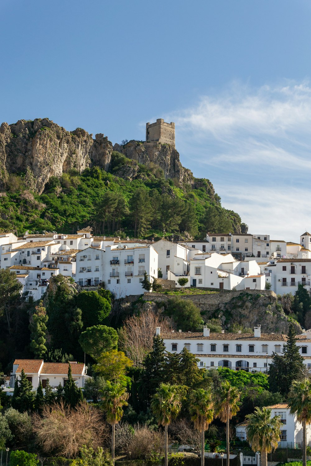 a white village on top of a hill