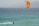 a person riding a surf board on a body of water