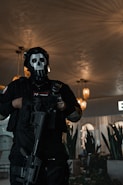 a man in a skeleton mask holding a gun
