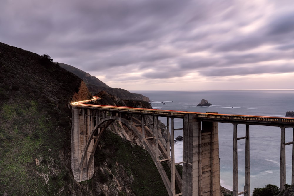 a train on a bridge over a body of water