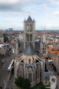 an aerial view of a cathedral in a city