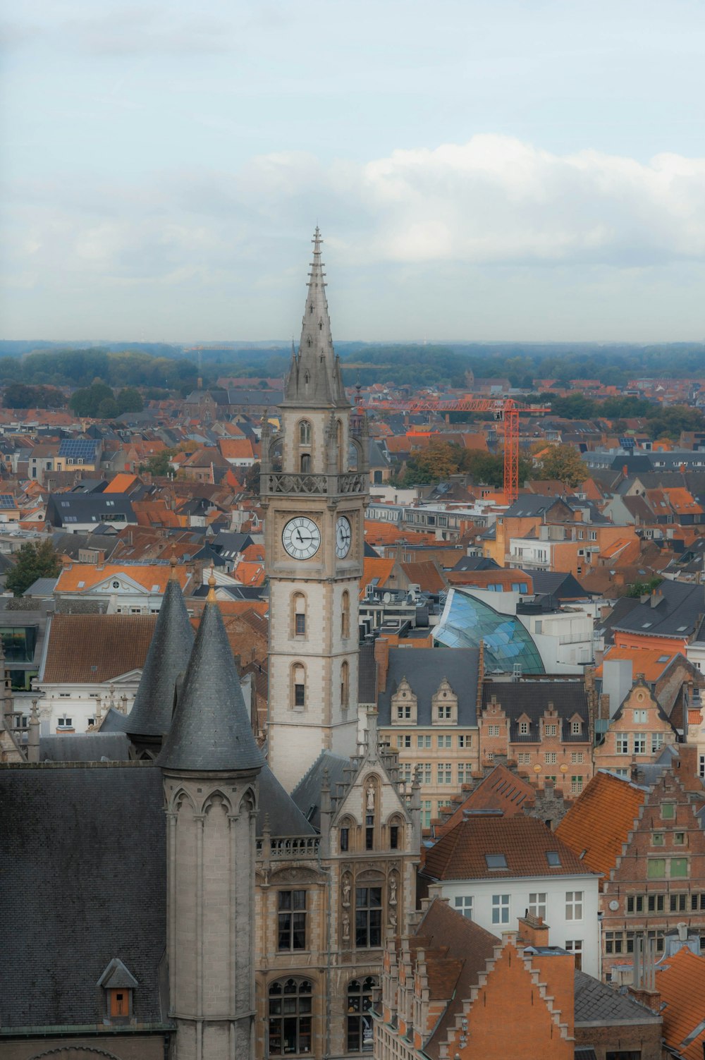 a large clock tower towering over a city