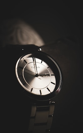 a close up of a watch on a table