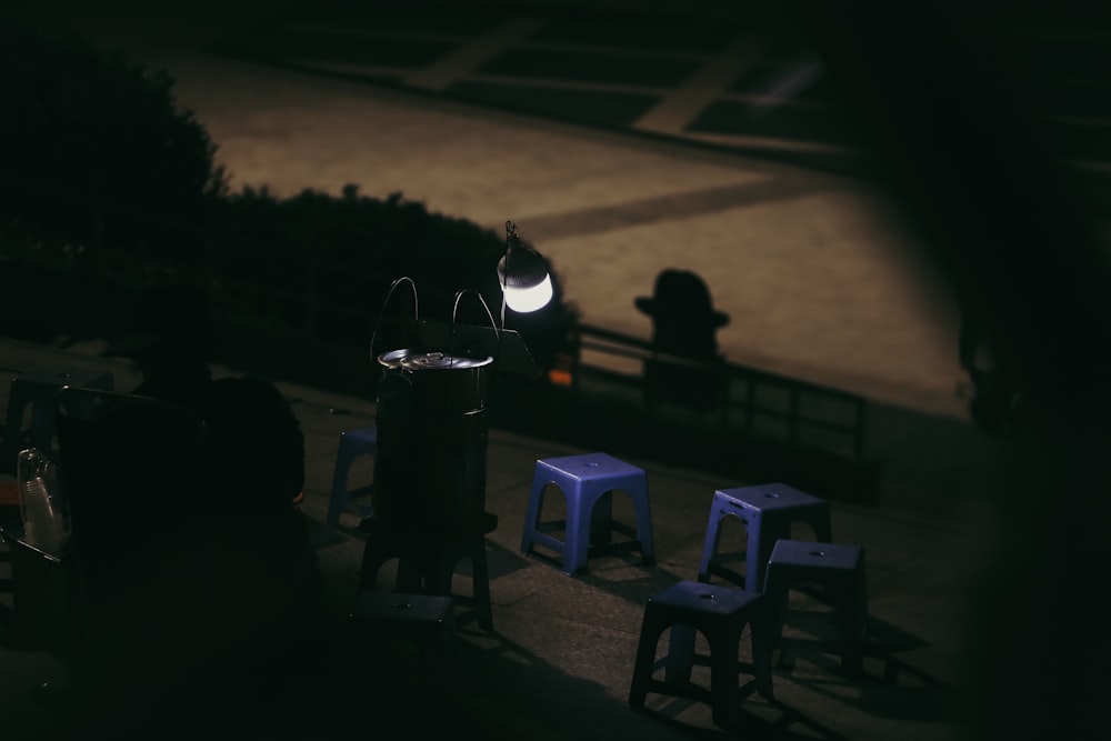 a couple of blue stools sitting next to each other