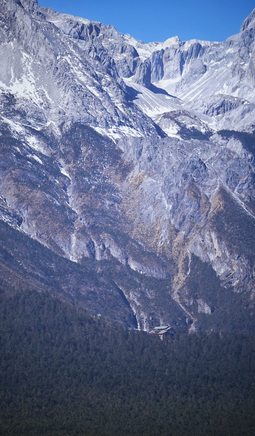 a view of a mountain range with a train on it