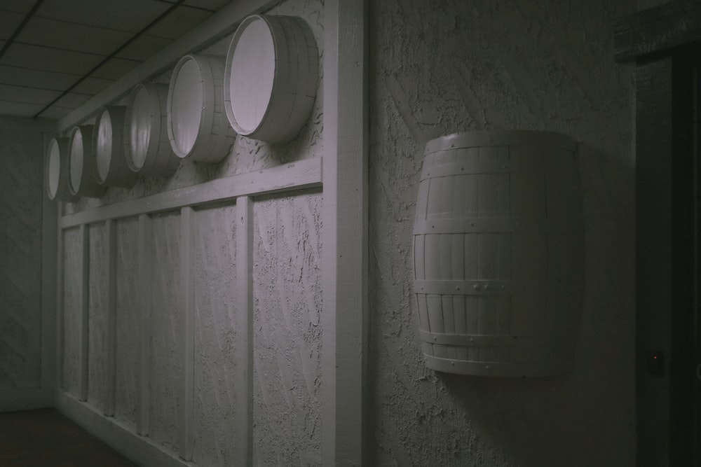 a room with a bunch of barrels on the wall