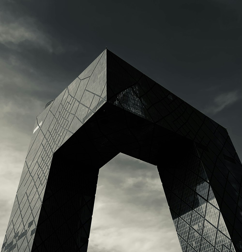 a very tall building with a sky in the background