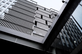 A panoramic view of a commercial property with glass facades.