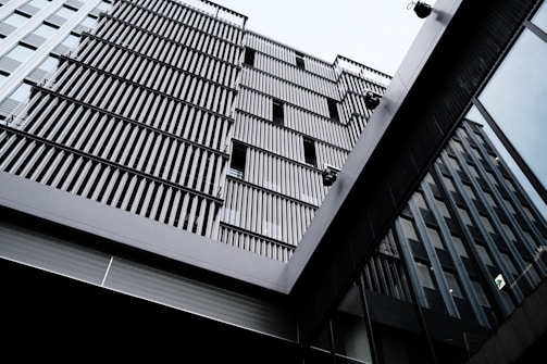 A panoramic view of a commercial property with glass facades.