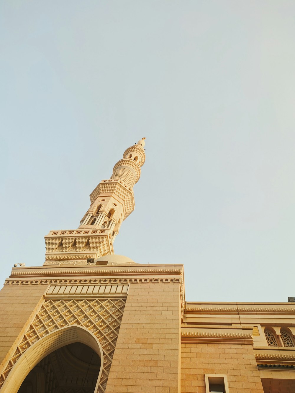 a tall building with a clock on the top of it