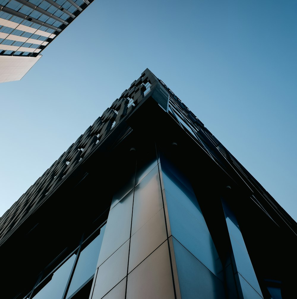 a tall building with a sky background