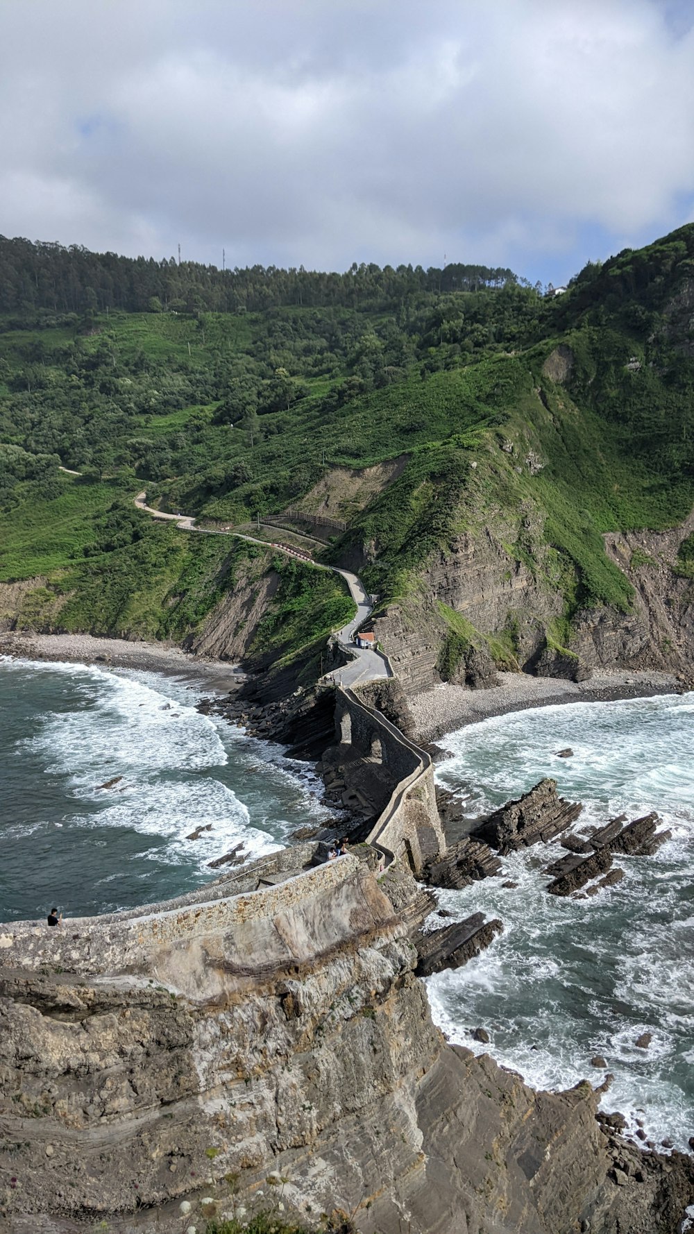 a view of the ocean from a cliff