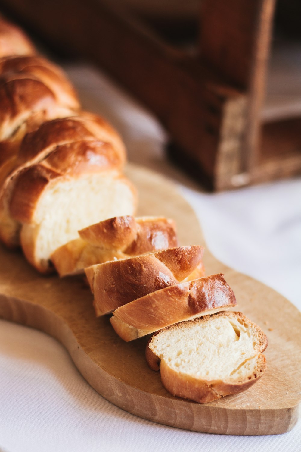 a loaf of bread sitting on top of a cutting board