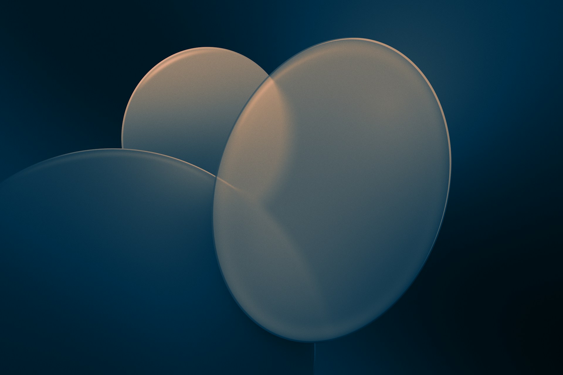 a group of white balloons floating in the air