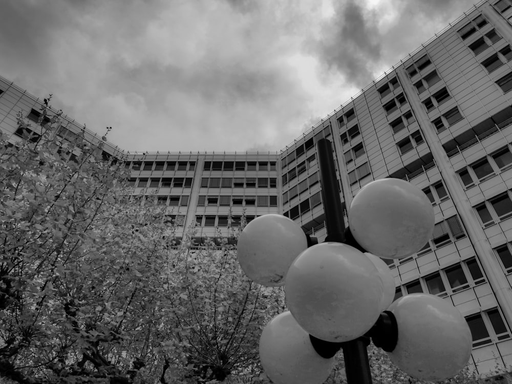 a black and white photo of a street light