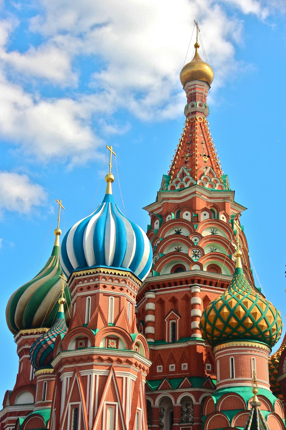 a very tall building with a blue and white dome