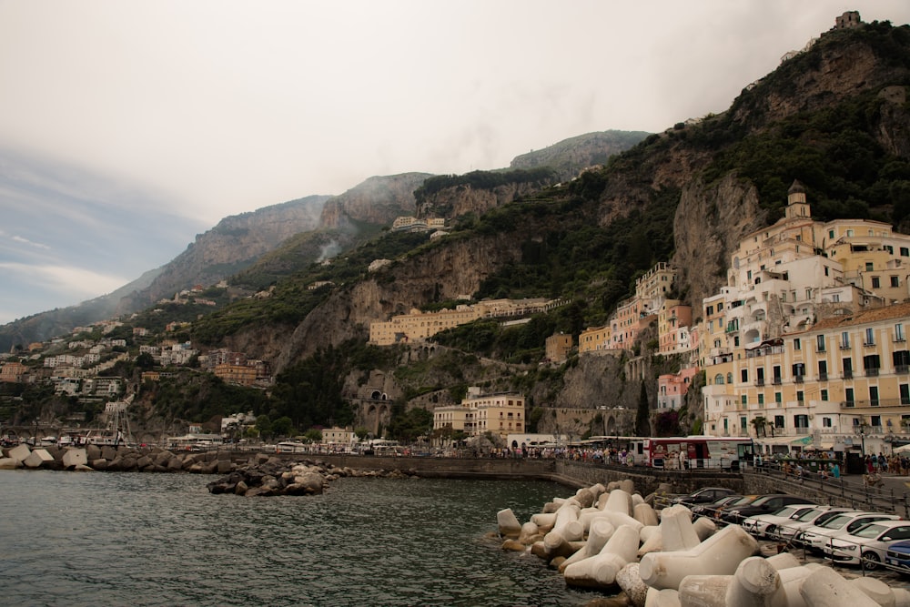 a body of water with a bunch of buildings on the side of it