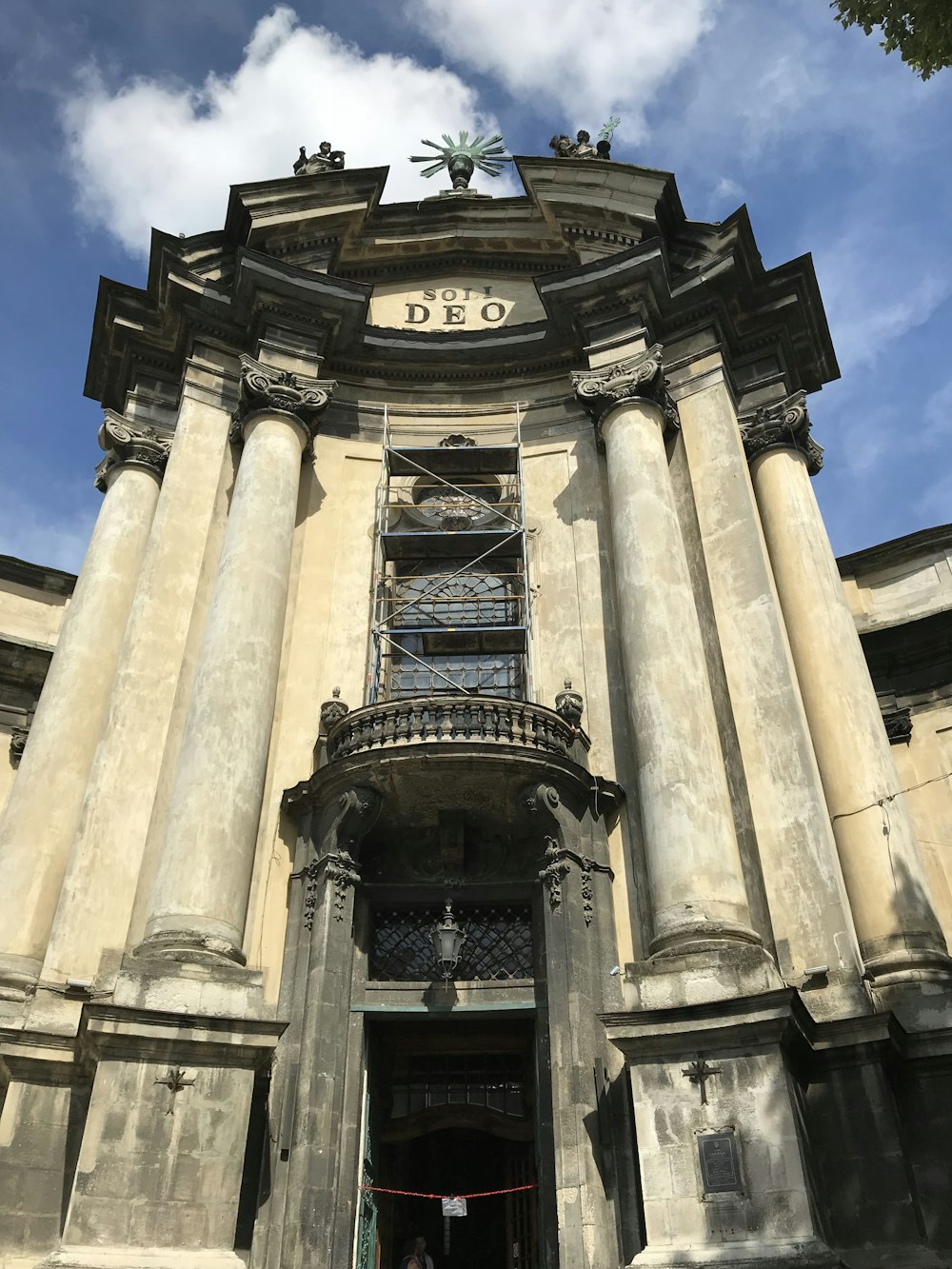 a tall building with a clock on the top of it